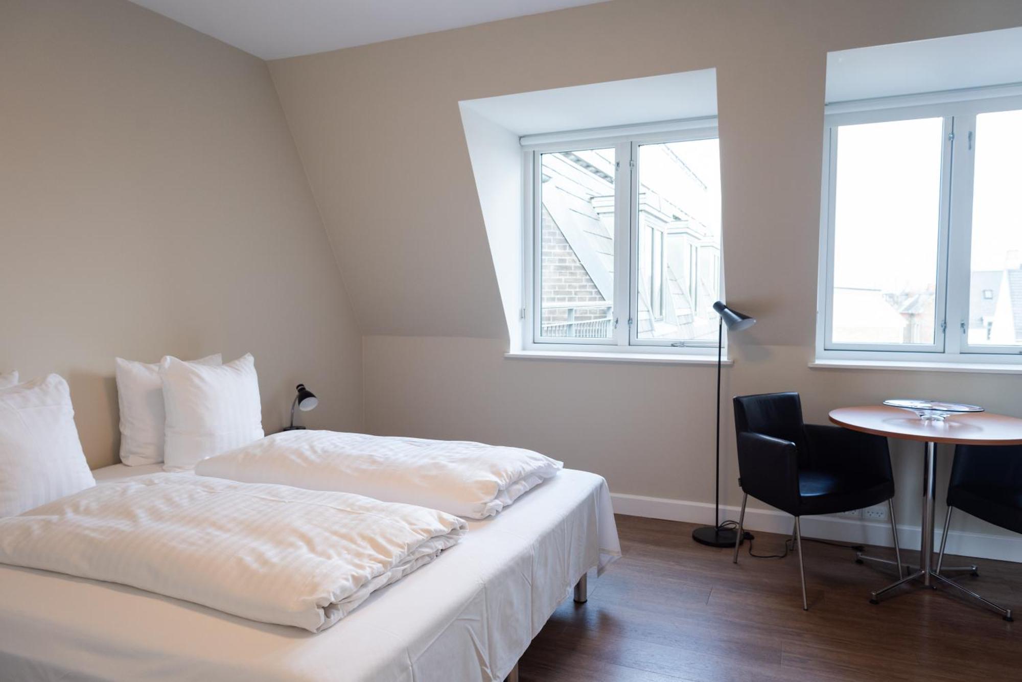 Doppel- oder Zweibettzimmer